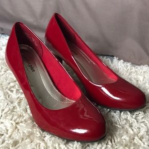Red closed toe pumps